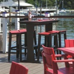 Bar stools and dining chairs made from enviro-wood, available in 18 colours, in a yacht club