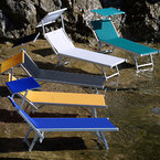 Aluminium sunbeds with sunshield, anodized, fabrics available in various colours, in a beach club